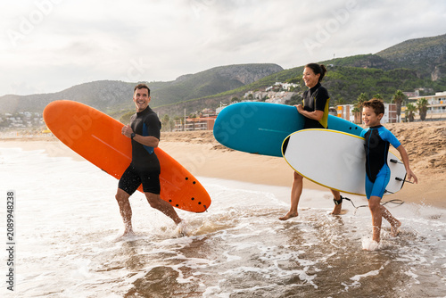 Photography Family learning surfing enjoying active beach vacation