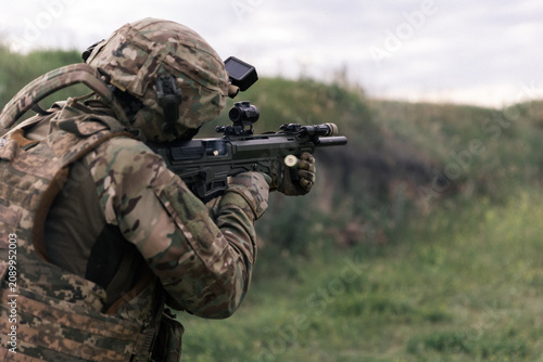 Canvastavla Ukrainian soldier aiming anti-drone shotgun weapon system