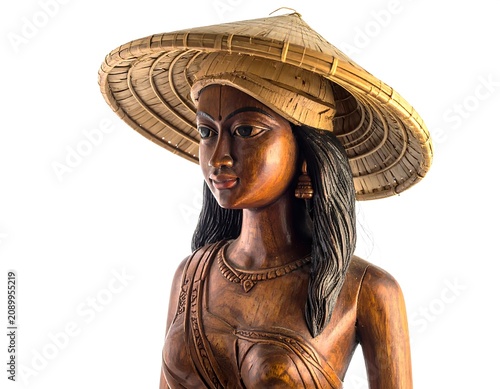 Woman wearing stylish wide brimmed straw hat outdoors.