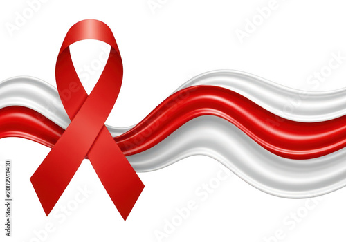Red awareness ribbon for hiv and aids support placed over a flowing white and red silk fabric wave isolated on a solid black background