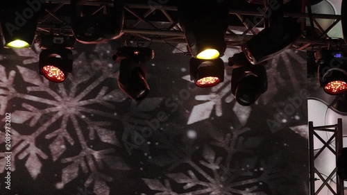 Spotlights in the concert hall. Stage light with colored spotlights and smoke.