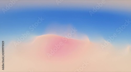 Sunset background with pink clouds floating gently across blue sky