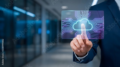Close up of a businessman touching a futuristic holographic cloud computing interface for managing digital business infrastructure with computing