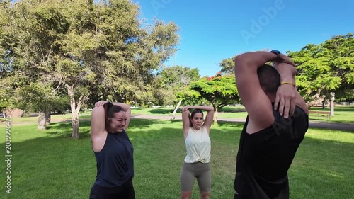 Girls training in a park with a personal trainer