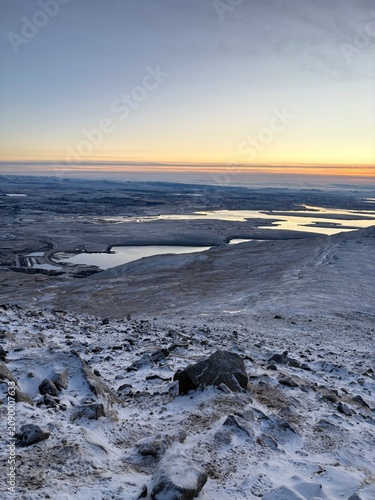 Winter mountain view over Icelandic lakes at sunset