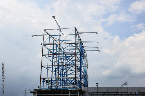 abandon Structure of steel for large advertising sign on the rooftop of a building.