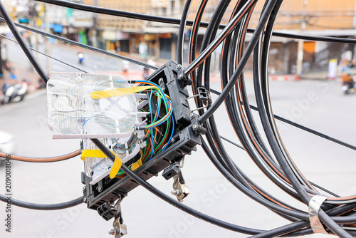 Cuadro en lienzo Broken Fiber Optic Splitter Box (Plc - Coupler) or Optical splitter equipment of high speed internet fiber cables and cable reels