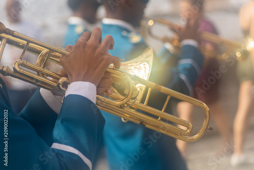 Cuadro en lienzo Detail of a musician playing a wind instrument at the Bahia Independence Day celebration