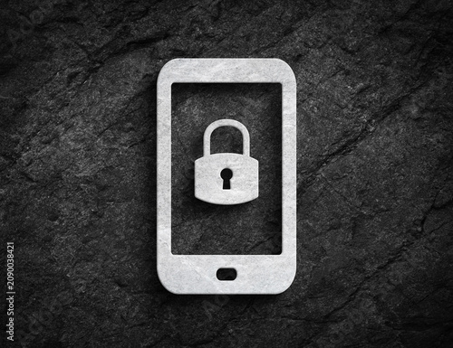 Smartphone with padlock security symbol on stone wall