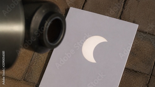 Viewing a solar eclipse safely through a DIY paper pinhole projector