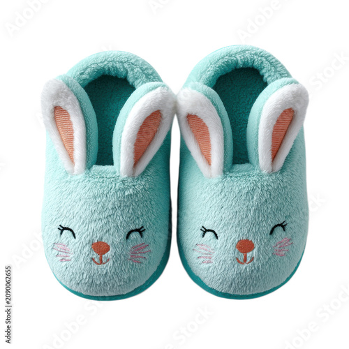 A pair of rabbit slippers with a smiling face on them