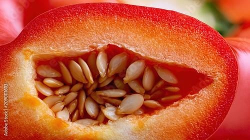 Close-up of a halved citrus fruit with visible seeds