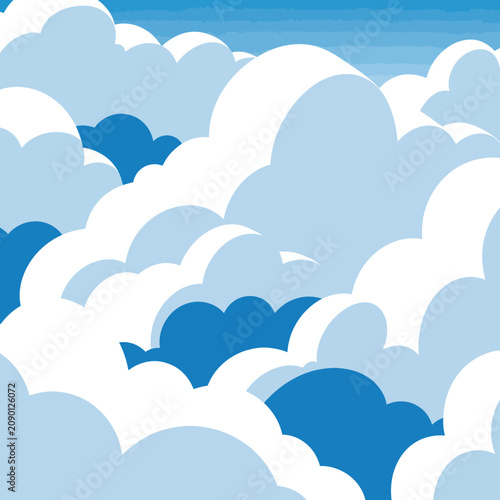 Fotografie White and blue cartoon puffy clouds.