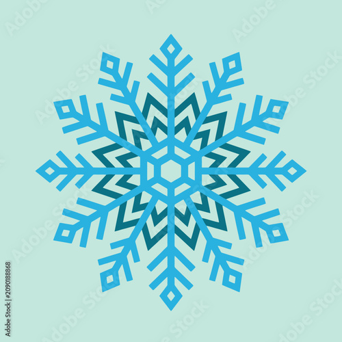 A geometric blue snowflake icon on a light green background