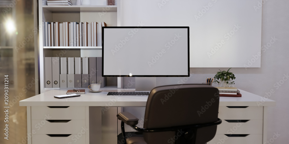 Fototapeta premium Home office desk setup with white computer screen mockup