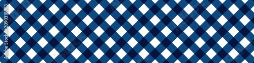 Quadro su tela Seamless diagonal gingham check pattern in navy blue and white, classic textile background