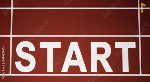 Start Line on a Running Track with White Markings.