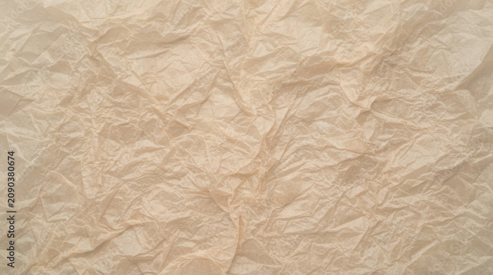 Fototapeta premium Crumpled Beige Parchment Paper Texture Background for Vintage Scrapbooking and Artistic Craft Projects with Wrinkled Surface Detail