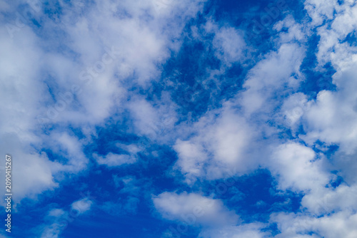 Foto Clouds move in the blue sky