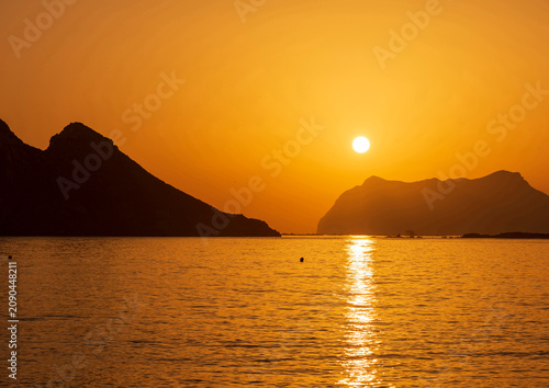 Landscape with a beautiful sunset on a quiet beach