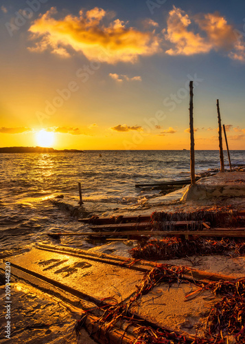 Landscape with a beautiful sunset on a quiet beach