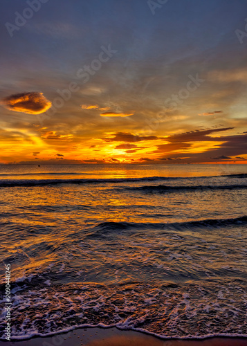 Landscape with a beautiful sunset on a quiet beach