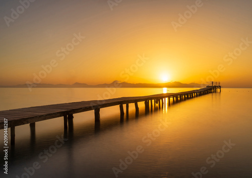 Landscape with a beautiful sunset on a quiet beach