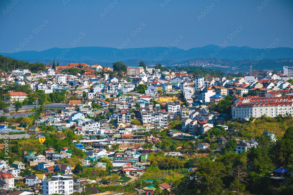 Fototapeta premium Panorama with aerial view of city of Dalat in Vietnam in Asia