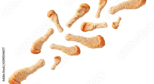 Crispy Fried Chicken Drumstick Snacks Scattered on White Background