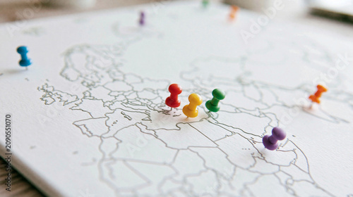 Map with Pushpins: A close-...