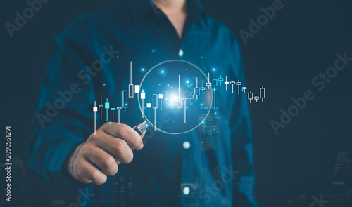 Konstfotografi Business analyst examining candlestick charts through magnifying glass, symbolizing stock market analysis, trading strategy, investment research, financial trends, risk assessment