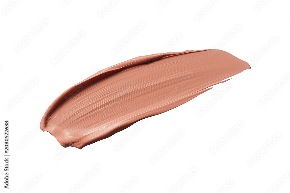 Fototapeta premium Liquid foundation or concealer smear with creamy texture and beige color, isolated on a transparent background