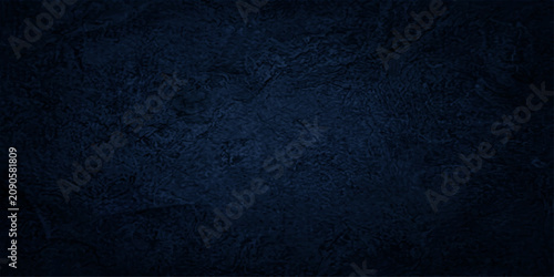 Bild auf Leinwand A deep navy blue textured background with subtle, dark swirling patterns suggests depth and mystery, evoking a sense of calm and sophistication