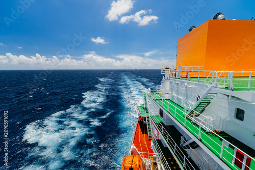 Fotografie Stern view of oil tanker in open sea or ocean