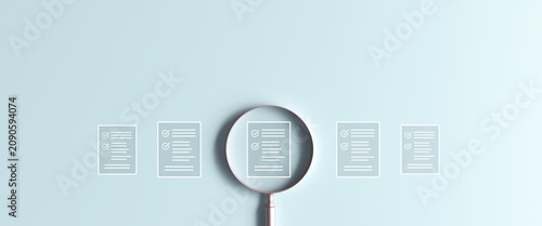 Schilderij op canvas Magnifying glass examining checklist document icon, focused on business audit an