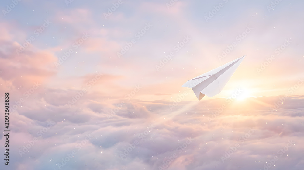 Fototapeta premium 光へ向かう紙飛行機