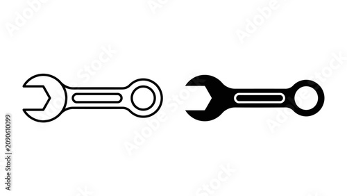Wrench Icon Duo: A graphic representation of two wrenches, one in outline and one in solid black, symbolizing tools and repair.