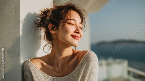 Young woman is using a white cream on her shoulder and her face,Facial care for female,moisturizing cream,healthy skin,Taking good care of her skin,Skin cream concept.