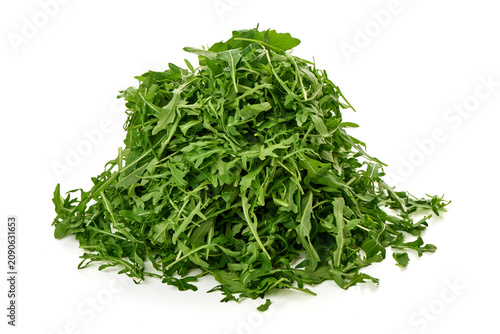 Schilderij op canvas Fresh Arugula Leaves Pile Isolated on White Background