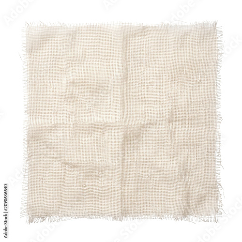 Фотография White gauze fabric piece with frayed edges