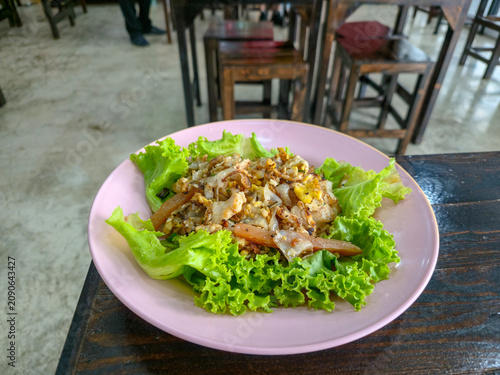 Restaurant-style Thai fried noodles beautifully presented for menus and commercial food photography.