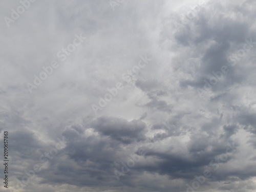 Картината върху платно Dramatic overcast sky with dark storm clouds before rain.