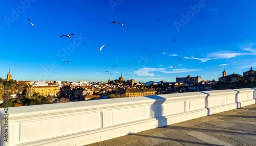 Sunny Historic City Skyline Viewed From White Terrace Under Clear Blue Sky