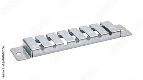 Metal six string guitar bridge on white background.