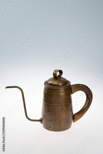 Fotografie Vintage copper gooseneck hand drip coffee kettle isolated on a white background