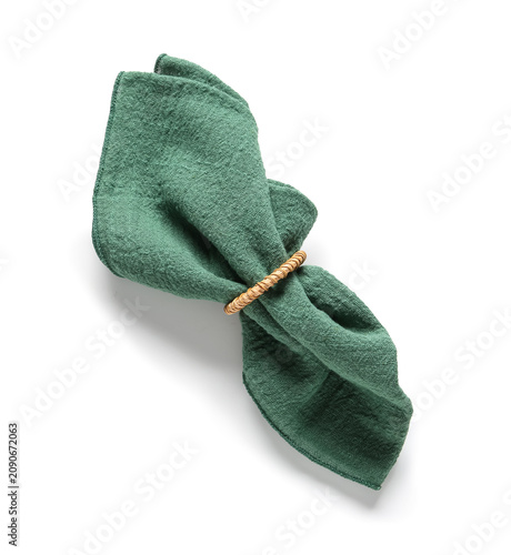 Folded green linen napkin w...