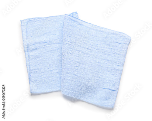 Obraz na plátně Two light blue muslin cloths or baby burp cloths for hygiene and cleaning, isola