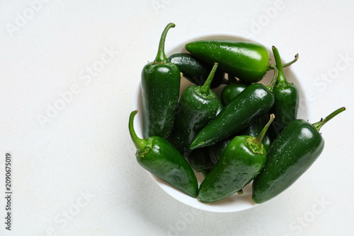 Bowl with green jalapeno pe...