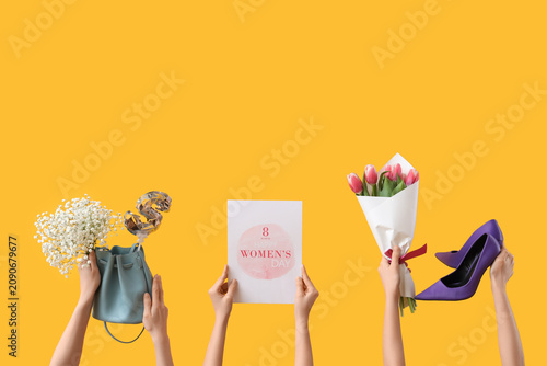 Female hands holding postca...
