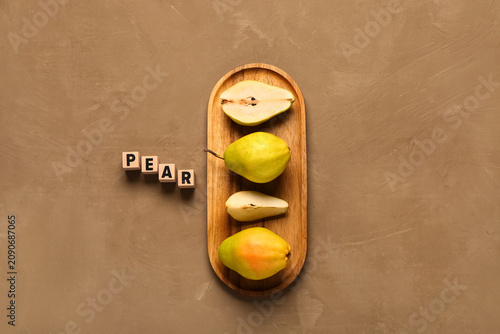Word PEAR and wooden board ...